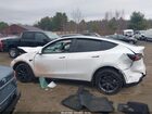 2024 Tesla Model Y Long Range Dual Motor All-wheel Drive White vin: 7SAYGDEE2RF152521