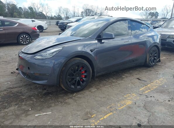 7SAYGDEE3PA154630 2023 TESLA MODEL Y Gray Vista tres cuartos delantera izquierda