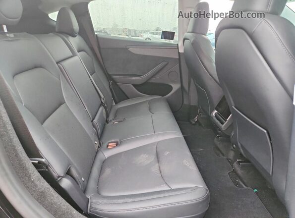 7SAYGDEE4TA432395 2026 TESLA MODEL Black Rear seats view