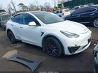 2022 Tesla Model Y Long Range Dual Motor All-wheel Drive White vin: 7SAYGDEE5NF310750