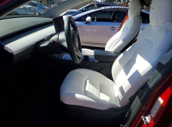 7SAYGDEE5NF369488 2022 TESLA MODEL Red Front interior view