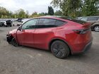 2026 Tesla Model Y Red vin: 7SAYGDEE5TF372355