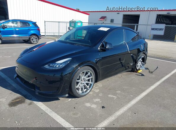 7SAYGDEE6NF376675 2022 TESLA MODEL Y Black წინა მარცხენა ხედი სამი მეოთხედიდან