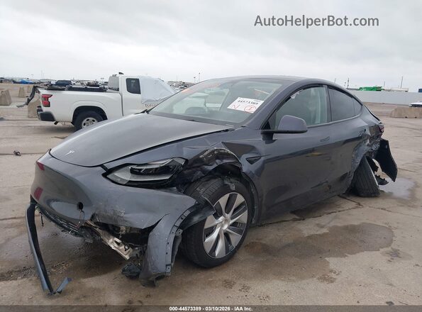 7SAYGDEE6PA190098 2023 TESLA MODEL Y Gray Առջևի ձախ երեք քառորդ տեսարան