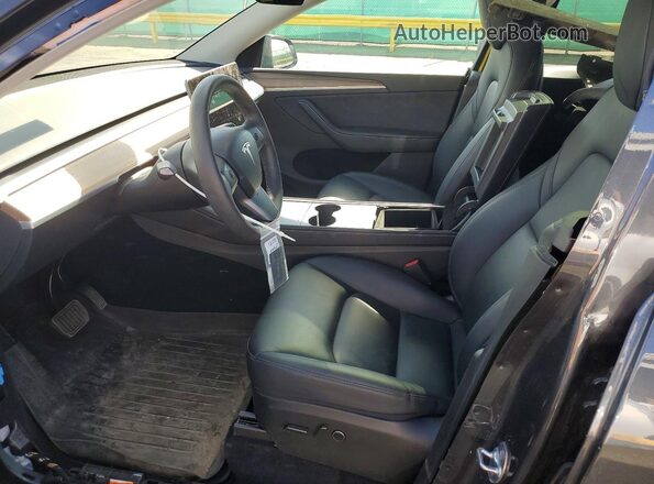 7SAYGDEE6SA356161 2025 TESLA MODEL Black Вид салону спереду