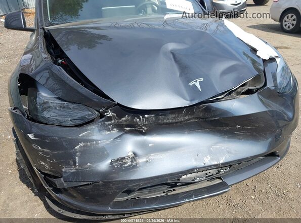 7SAYGDEE6SF308131 2025 TESLA MODEL Y Gray Front view