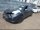 2025 Tesla Model Y Long Range Dual Motor All-wheel Drive Gray vin: 7SAYGDEE6SF308131