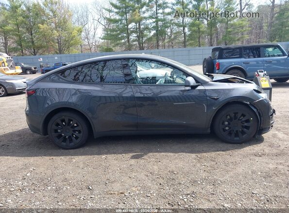 7SAYGDEE6SF308131 2025 TESLA MODEL Y Gray Instrument cluster view