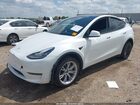 2023 Tesla Model Y Awd/long Range Dual Motor All-wheel Drive White vin: 7SAYGDEE7PA149883