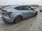 2025 Tesla Model Y Gray vin: 7SAYGDEE7SA360073