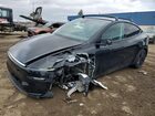 2026 Tesla Model Y Black vin: 7SAYGDEE7TA490906