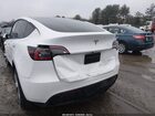 2023 Tesla Model Y Awd/long Range Dual Motor All-wheel Drive White vin: 7SAYGDEE8PA061232