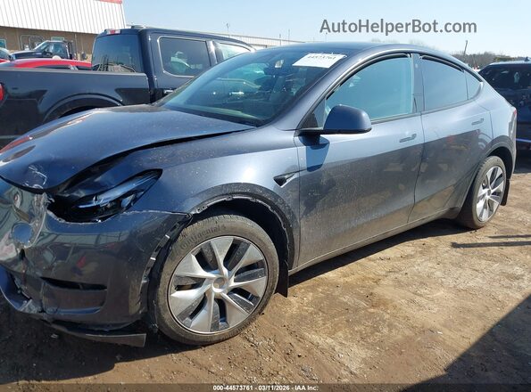 7SAYGDEE8PA085725 2023 TESLA MODEL Y Gray Widok wnętrza z tyłu