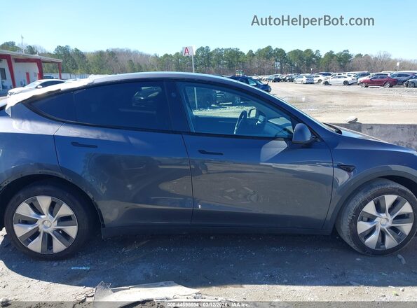 7SAYGDEE8PA210870 2023 TESLA MODEL Y Gray Вид задньої частини салону