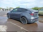 2023 Tesla Model Y Awd/long Range Dual Motor All-wheel Drive Gray vin: 7SAYGDEE8PF638442