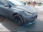 2023 Tesla Model Y Awd/long Range Dual Motor All-wheel Drive Gray vin: 7SAYGDEE8PF638442