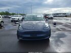 2023 Tesla Model Y Awd/long Range Dual Motor All-wheel Drive Gray vin: 7SAYGDEE8PF638442