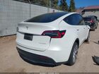 2023 Tesla Model Y Awd/long Range Dual Motor All-wheel Drive White vin: 7SAYGDEE8PF865808