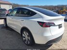 2023 Tesla Model Y Awd/long Range Dual Motor All-wheel Drive White vin: 7SAYGDEE8PF865808