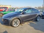2026 Tesla Model Y Gray vin: 7SAYGDEE9TA380472