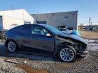 2026 Tesla Model Y Gray vin: 7SAYGDEE9TA410232