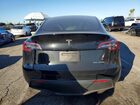 2024 Tesla Model Y Black vin: 7SAYGDEEXRA236129