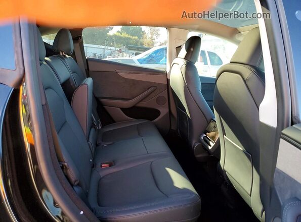7SAYGDEEXTF374232 2026 TESLA MODEL Black Rear seats view