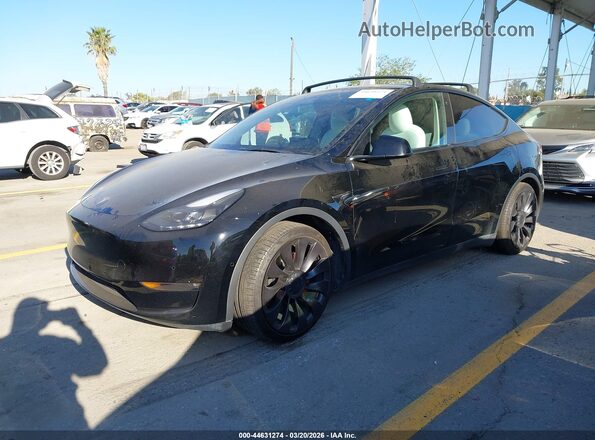 7SAYGDEF1NF392727 2022 TESLA MODEL Y Black წინა მარცხენა ხედი სამი მეოთხედიდან