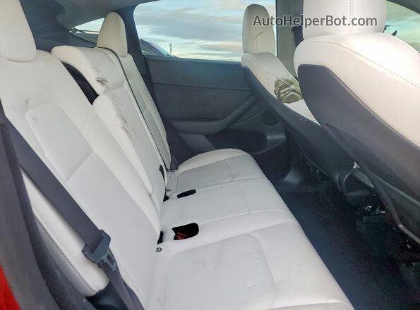 7SAYGDEF2RF024417 2024 TESLA MODEL Red უკანა სალონის ხედი