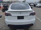 2023 Tesla Model Y Performance Dual Motor All-wheel Drive White vin: 7SAYGDEF4PF621341