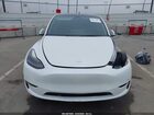2023 Tesla Model Y Performance Dual Motor All-wheel Drive White vin: 7SAYGDEF4PF621341