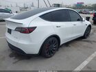 2023 Tesla Model Y Performance Dual Motor All-wheel Drive White vin: 7SAYGDEF4PF621341