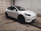 2023 Tesla Model Y Performance Dual Motor All-wheel Drive White vin: 7SAYGDEF7PF811182
