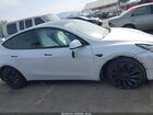 2024 Tesla Model Y Performance Dual Motor All-wheel Drive White vin: 7SAYGDEF9RF061075