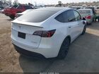 2024 Tesla Model Y Performance Dual Motor All-wheel Drive White vin: 7SAYGDEF9RF061075