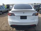2024 Tesla Model Y Performance Dual Motor All-wheel Drive White vin: 7SAYGDEF9RF061075