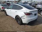 2024 Tesla Model Y Performance Dual Motor All-wheel Drive White vin: 7SAYGDEF9RF061075