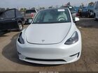 2024 Tesla Model Y Performance Dual Motor All-wheel Drive White vin: 7SAYGDEF9RF061075
