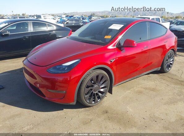 7SAYGDEF9RF101218 2024 TESLA MODEL Y Red Առջևի ձախ երեք քառորդ տեսարան