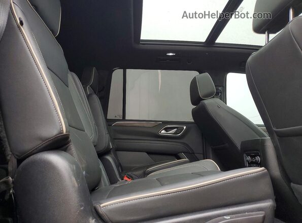 1GNSKFKDXNR233383 2022 CHEVROLET SUBURBAN Black Vista interior trasera