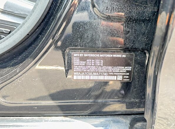 WBAJA7C58JWA71740 2018 BMW OTHER Черный Вид задней части салона