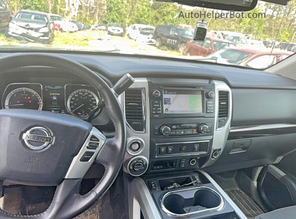 1N6BA1F45HN511513 2017 NISSAN TITAN Black Vista de los asientos traseros
