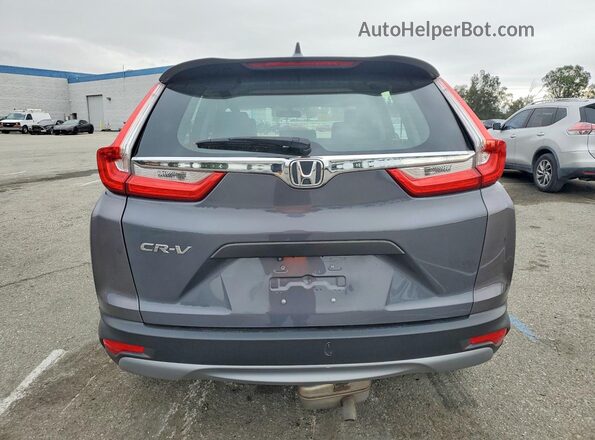 2HKRW5H38JH417355 2018 HONDA CRV Серый Вид салона спереди
