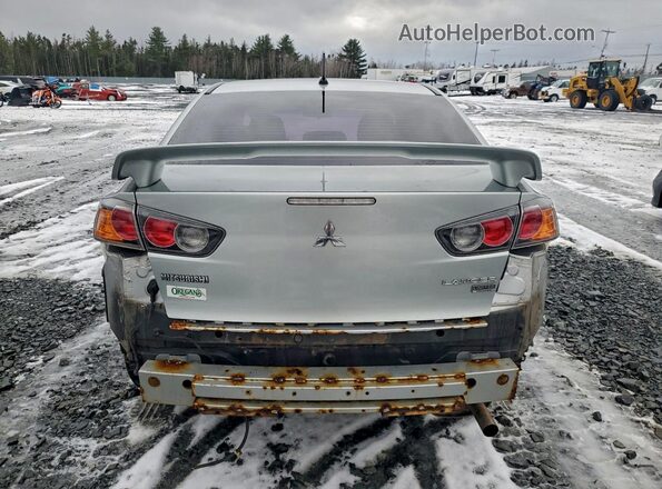 JA32U2FU7GU603516 2016 MITSUBISHI LANCER Серый Вид сзади