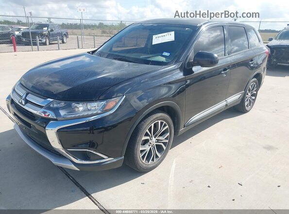 JA4AD2A3XGZ016719 2016 MITSUBISHI OUTLANDER Черный Передняя левая четверть