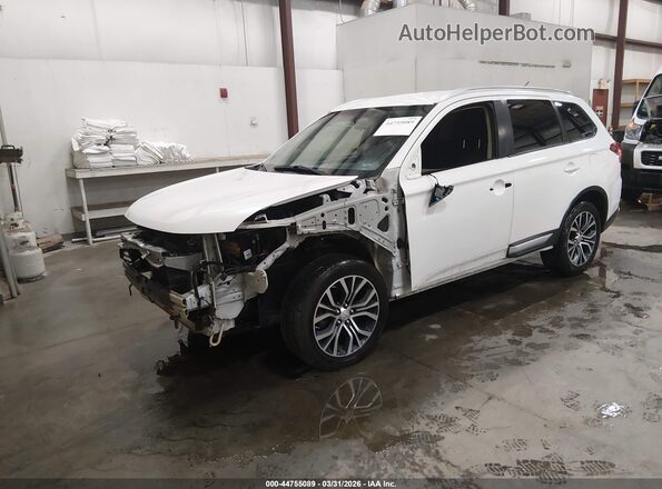 JA4AD3A3XGZ052660 2016 MITSUBISHI OUTLANDER White Vista tres cuartos delantera izquierda
