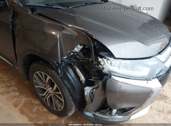 JA4AZ3A3XGZ024259 2016 MITSUBISHI OUTLANDER Gray Widok z przodu