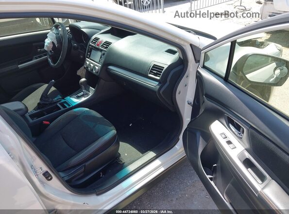 JF2GPABC3G8322183 2016 SUBARU CROSSTREK White Vista interior delantera