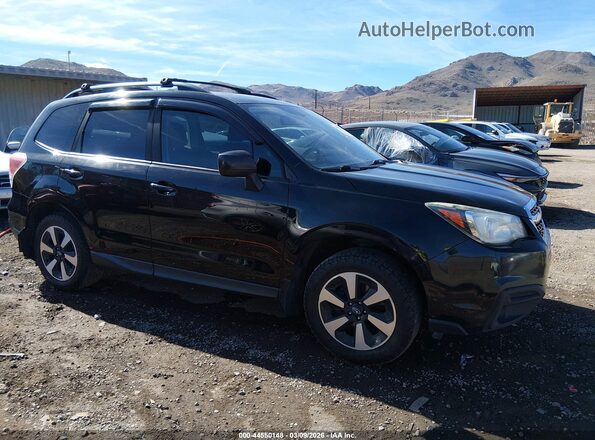 JF2SJABC9JH538073 2018 SUBARU FORESTER 2.5 Черный Вид задней части салона