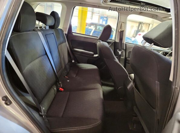 JF2SJADC8GH527829 2016 SUBARU FORESTER 2.5 Серебряный Вид задней части салона
